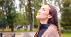 Woman smiling and breathing freely