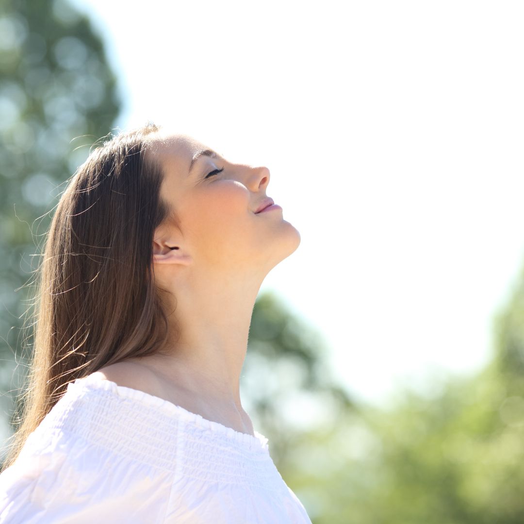 person breathing fresh air